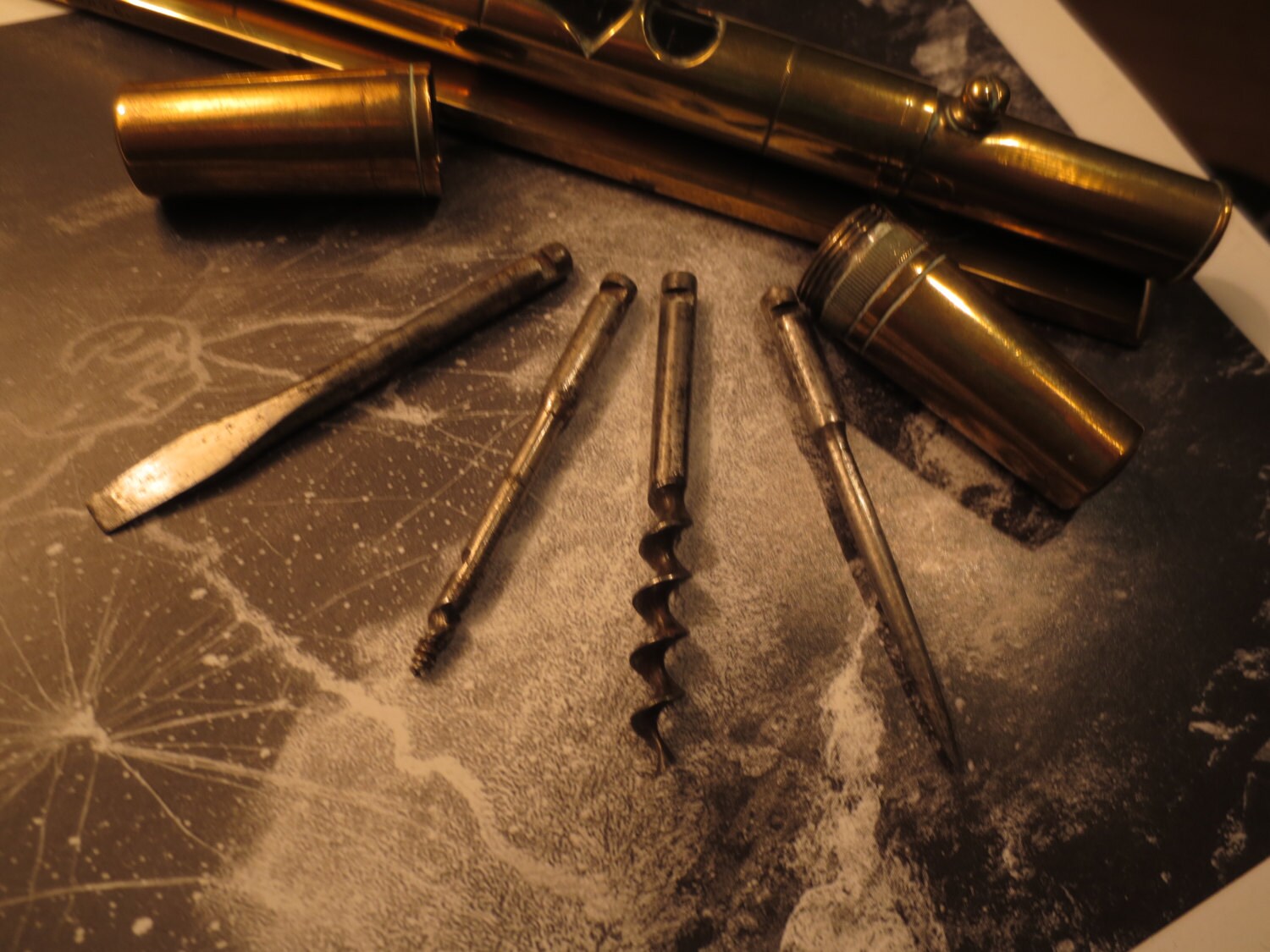 Pocket MultiTool including a Corkscrew Screwdriver Drill