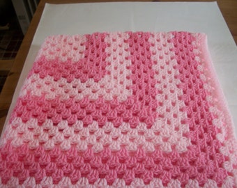 Hand crocheted baby blanket. Pale and mid pink. Suitable for car seat, crib, pram or moses basket. Ideal just to wrap baby in.