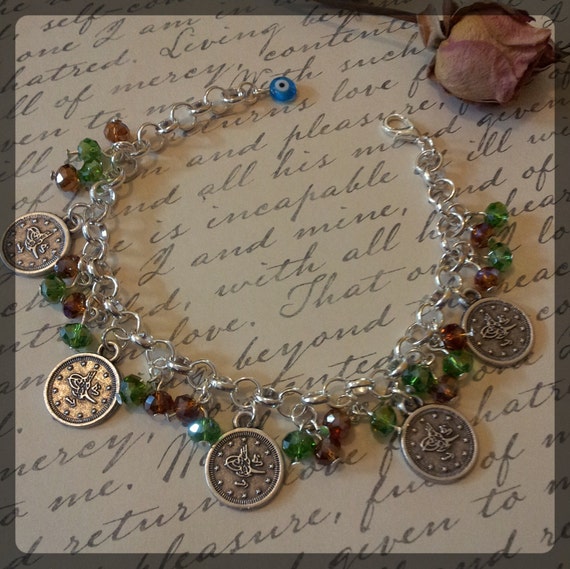 Handmade charm bracelet with crystal beads and by BanSisDesign