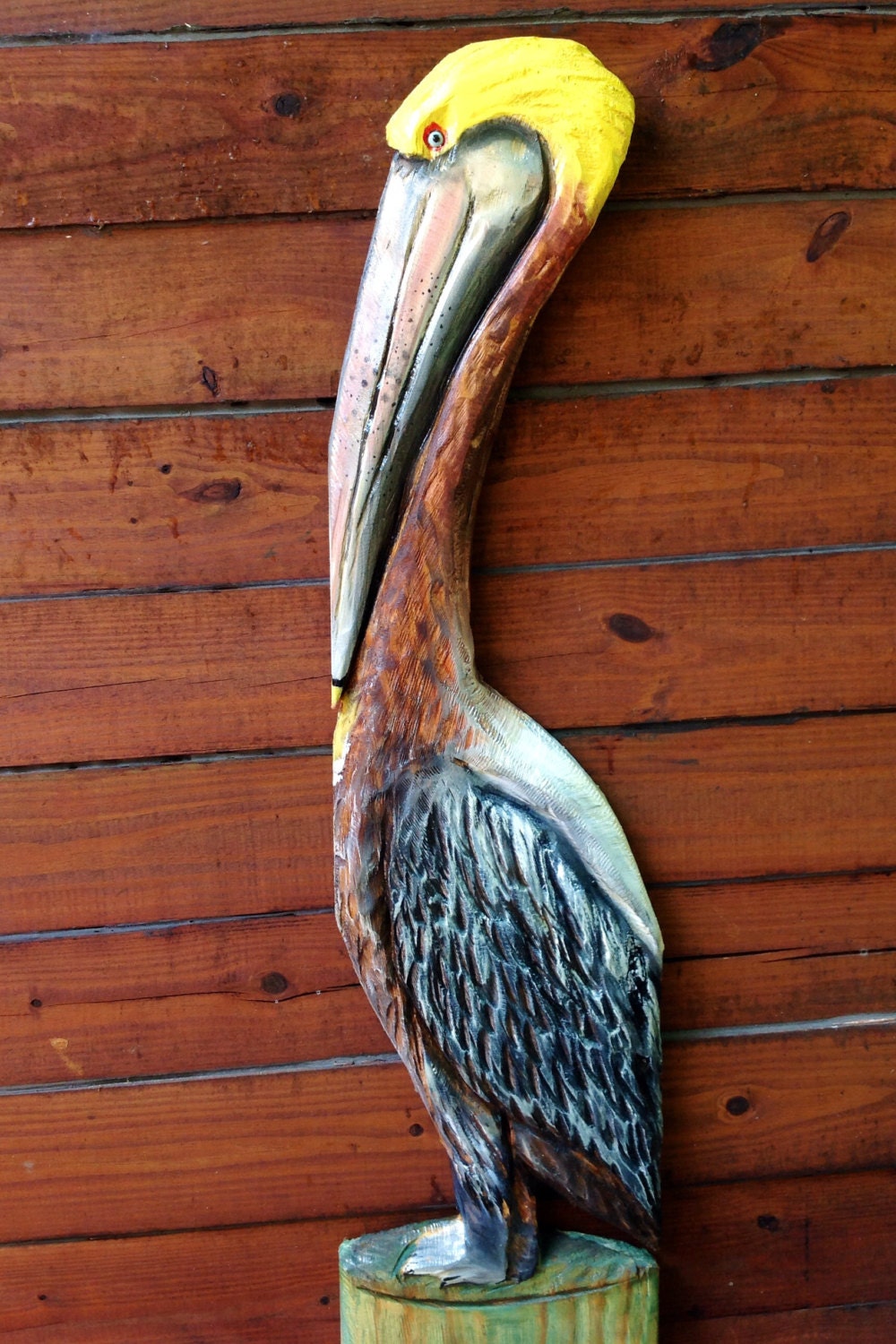 Pelican on the Pier 4ft. chainsaw carved saltwater wild bird