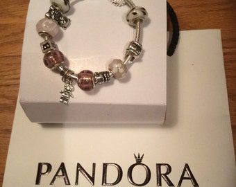 Authentic Pandora sterling silver bracelet with "new mom" theme. One-of-a-kind. Perfect for Christmas