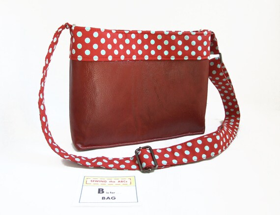 red polka dot purse