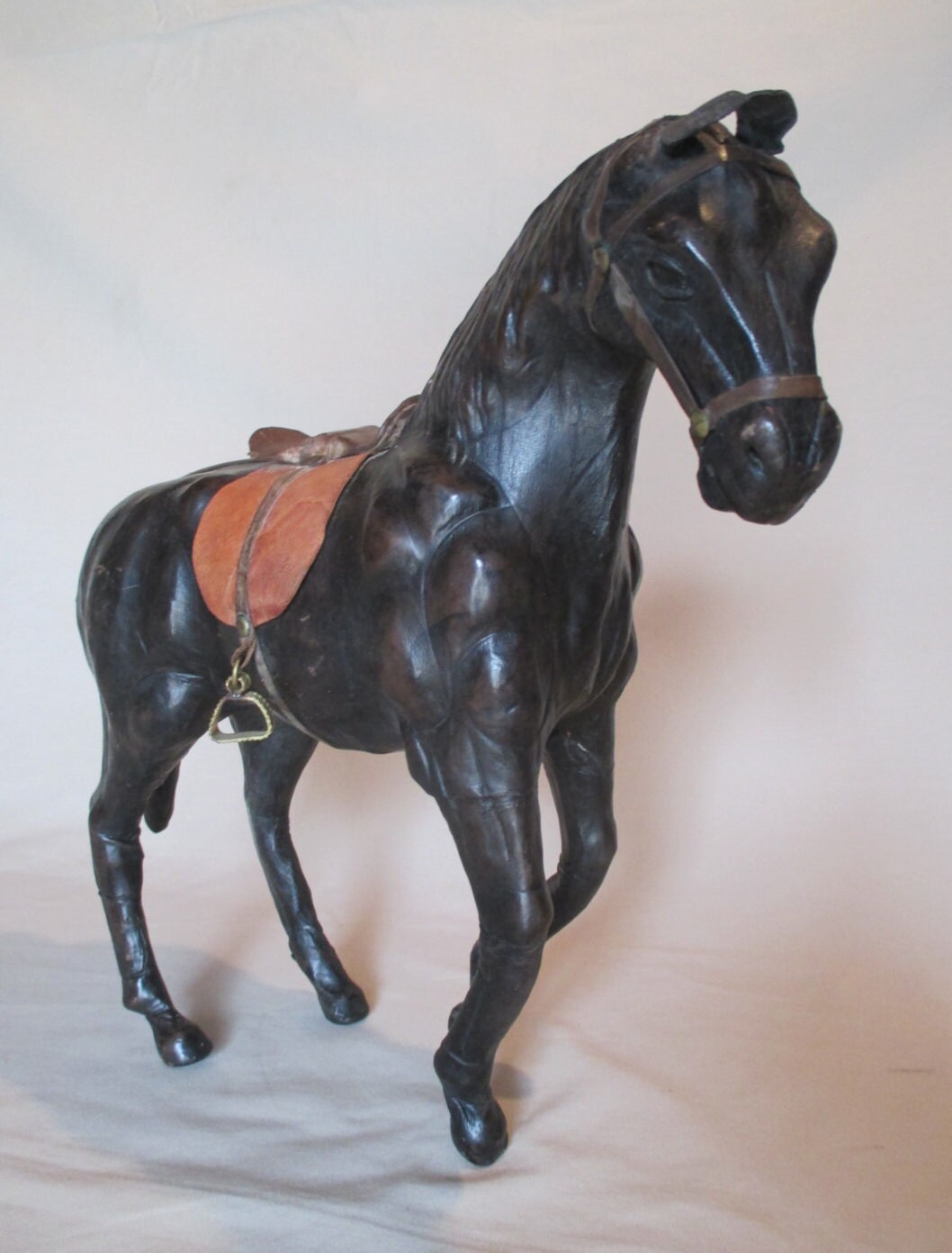 leather covered horse figurine