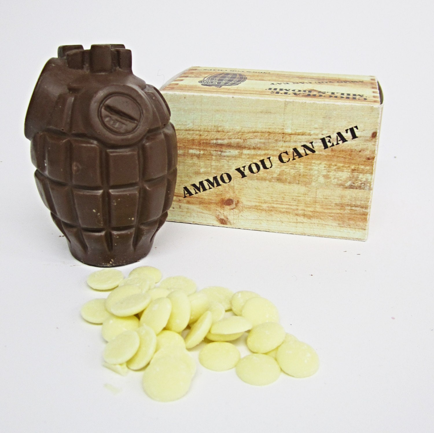 Milk chocolate hand grenade with white chocolate buttons