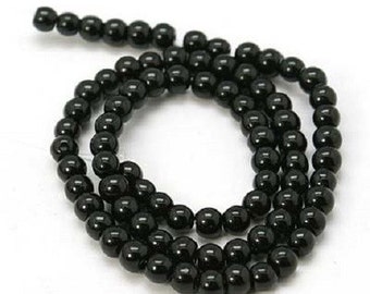 60 perles en verre rondes noires dimensions 4 mm