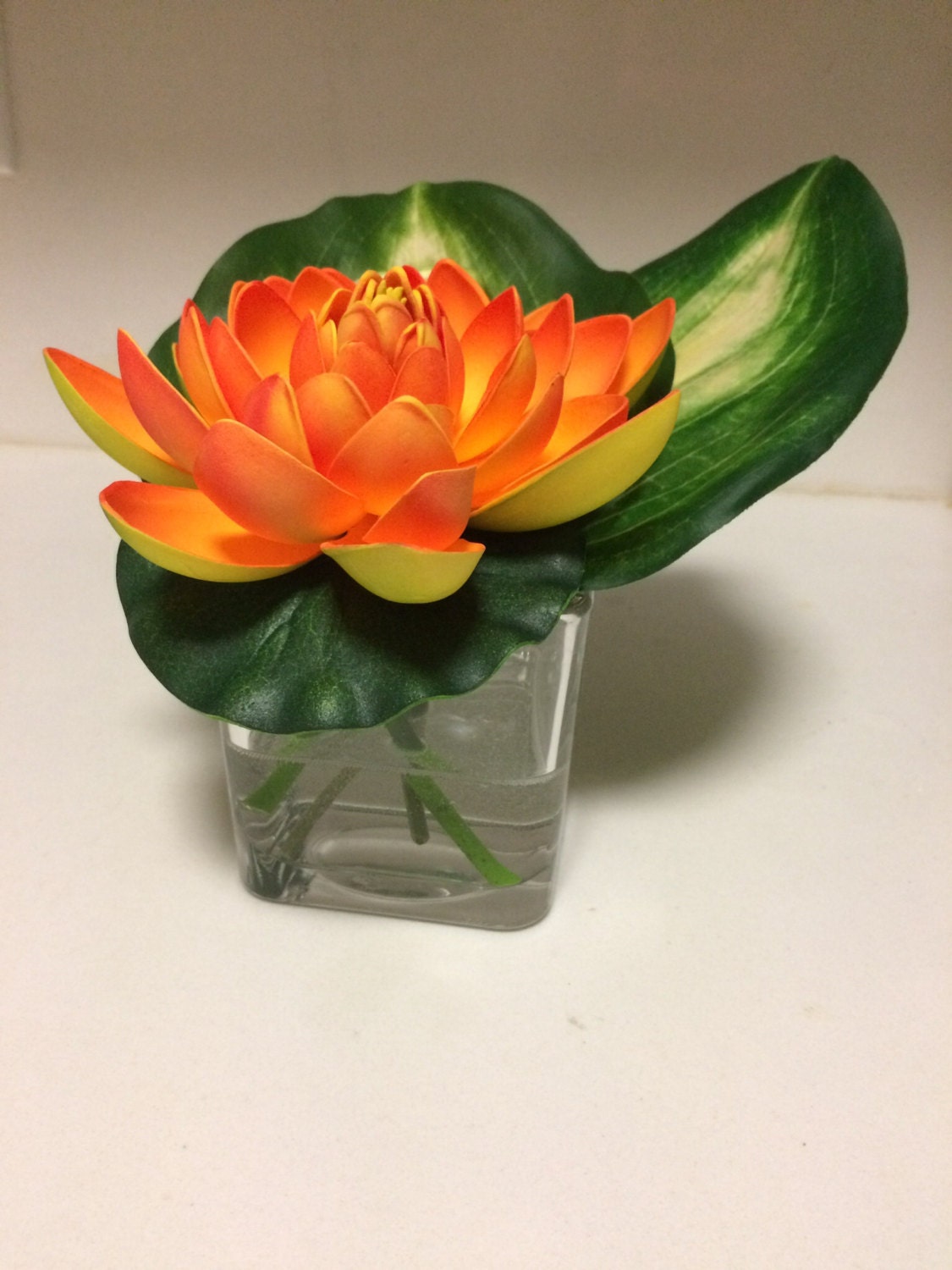 Faux Water Lily arrangement in acrylic water by