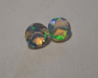 Faceted Natural Welo Crystal Opal .... 2 pcs .... 4 mm Round ......... B1820