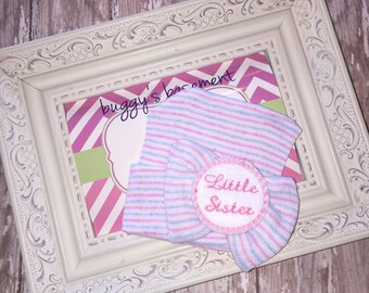 Newborn hospital hat little sister