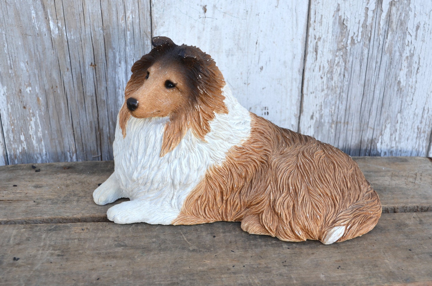 concrete sheltie dog statue