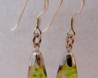 Green flecked drop earrings.