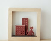 Cat and the city wall decor, red cat with tall buildings in wooden frame, table- wall decor, ceramic cat and buildings in light color frame