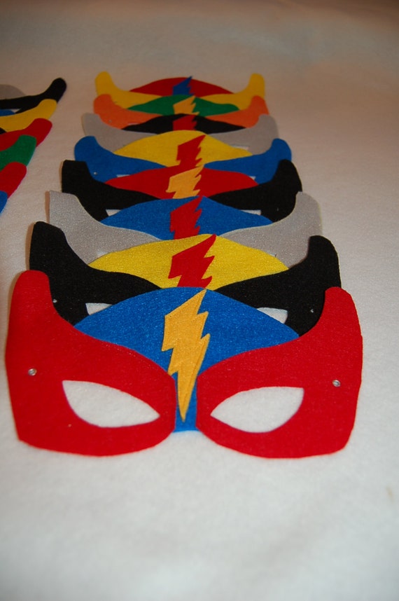 Items similar to Superhero mask ( set of 12 party favors) child size
