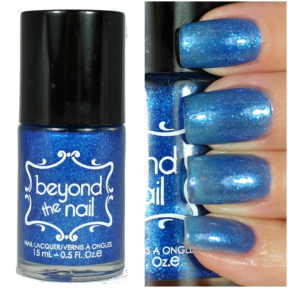 Blue Oyster Sheer Blue Jelly Nail Polish with Blue Flakies