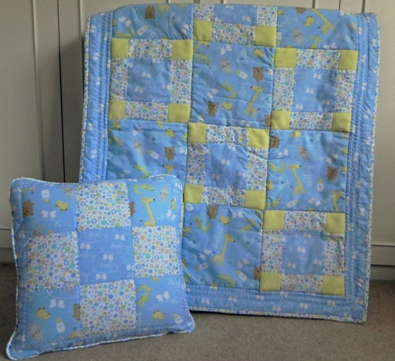 Items similar to Blue quilt and cushion nursery set on Etsy
