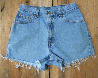 Items similar to Levi's cut off denim shorts on Etsy