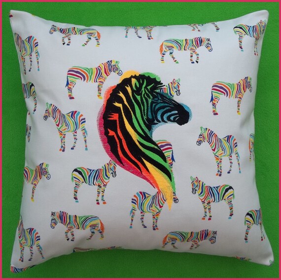 Machine embroidered rainbow zebra throw pillow by CushionRock