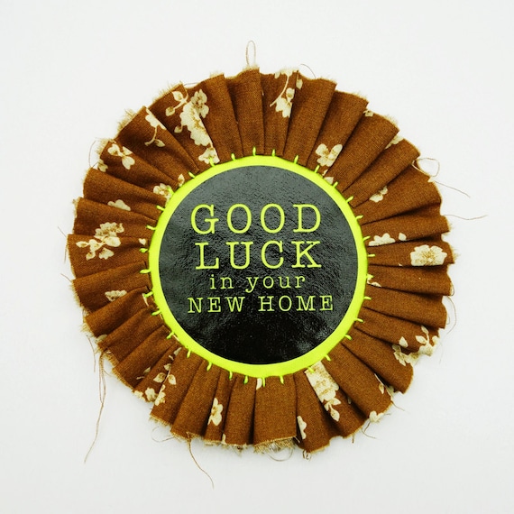 Items similar to GOOD LUCK in your new home ROSETTE pin