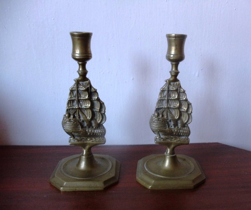 2 Vintage brass ship candle holders.