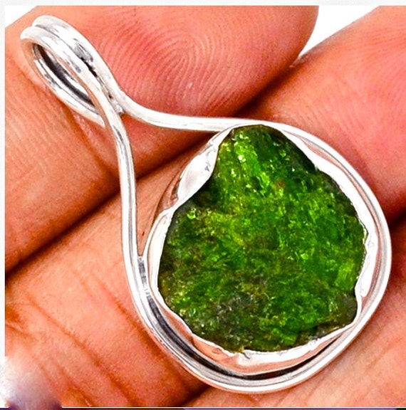 Raw Emerald Pendant in Handmade cut Sterling Silver. by AmyKJewels