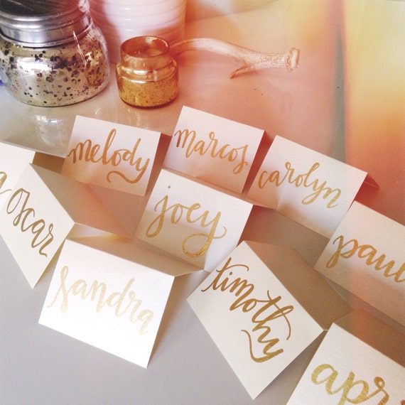 Metallic gold hand calligraphy place cards