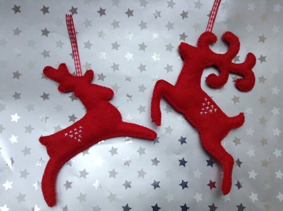 felt reindeer hanging decorations in red set of two felt reindeer hanging decorations in red set of two