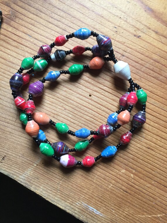 Items similar to African Bead Triple Strand Bracelet on Etsy