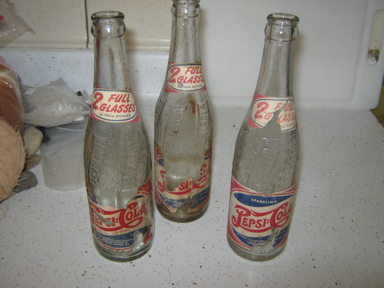 Vintage paper wrapped Pepsi Bottles