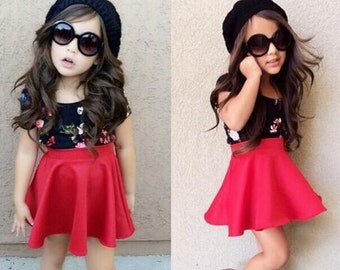 Black Flower Top and Red Skirt