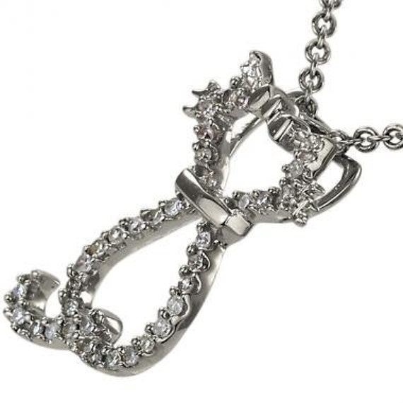 Cat Necklace In White Gold Featuring A Delicate Necklace