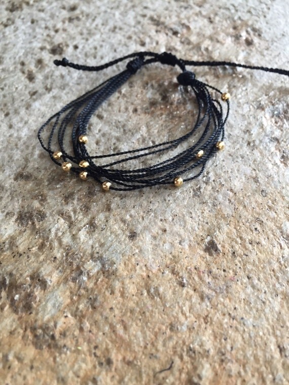 Items similar to Golden Beads on Etsy