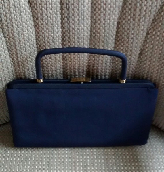 Items similar to Vintage Navy Colored Purse with Fold Away Handle on Etsy