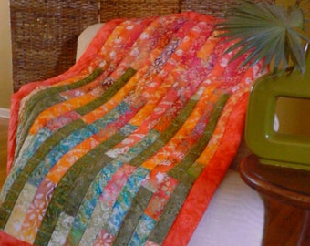Boho style modern red/green/orange batik lap quilt