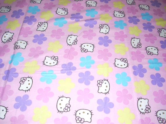 Hello Kitty Flannel Fabric pastel pink background with