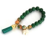 Green leather tassel bracelet, bohemian jewelry, elephant charm bracelet, green stretch bracelet, stack bracelets,  kelly green tassels