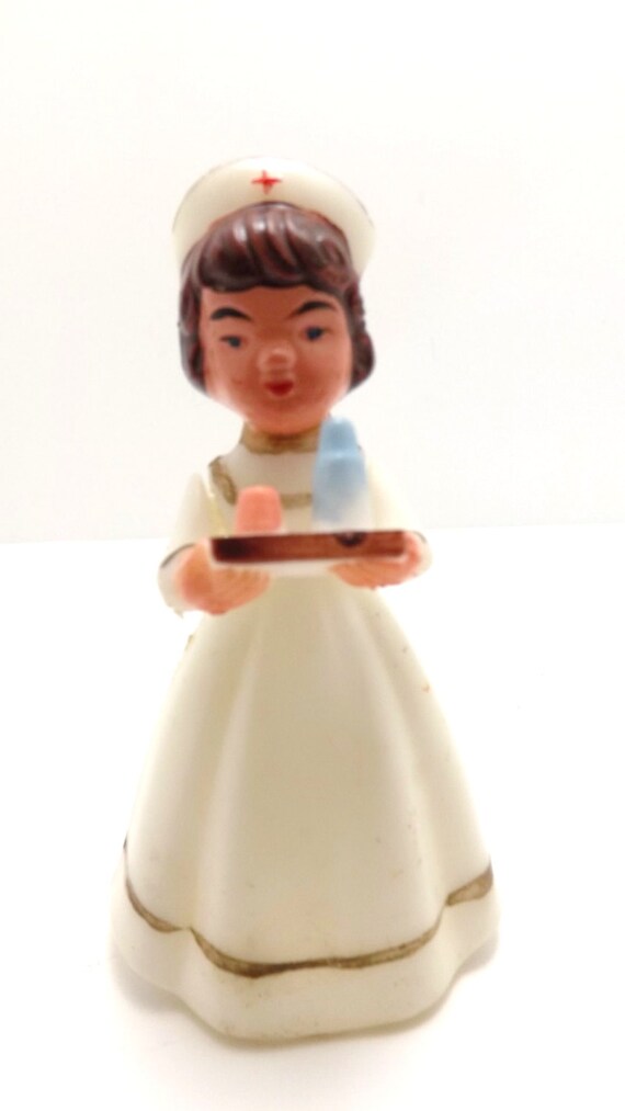 vintage antique plastic nurse figurine