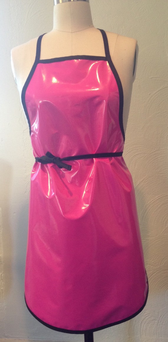 Hot Pink oilcloth adult apron with black trim and ties