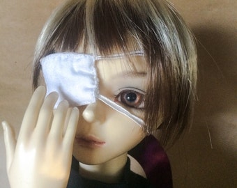 doll with eye patch