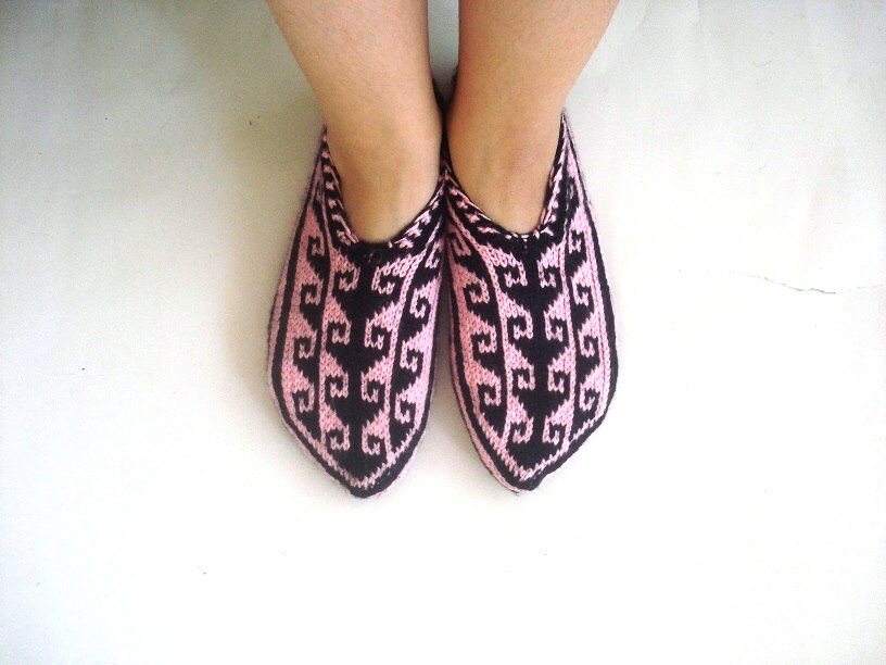 pink and black slippers
