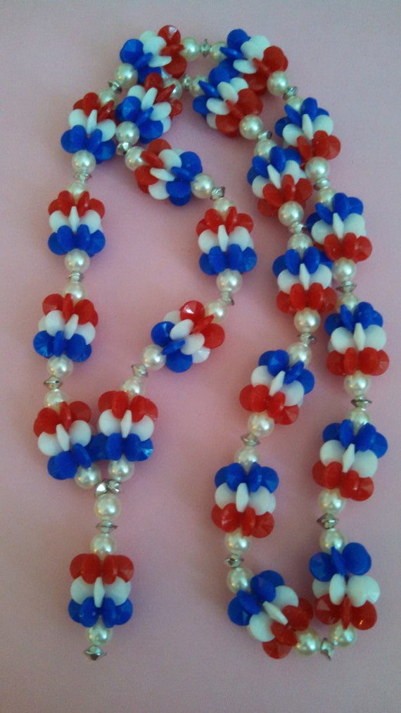 red plastic bead necklace