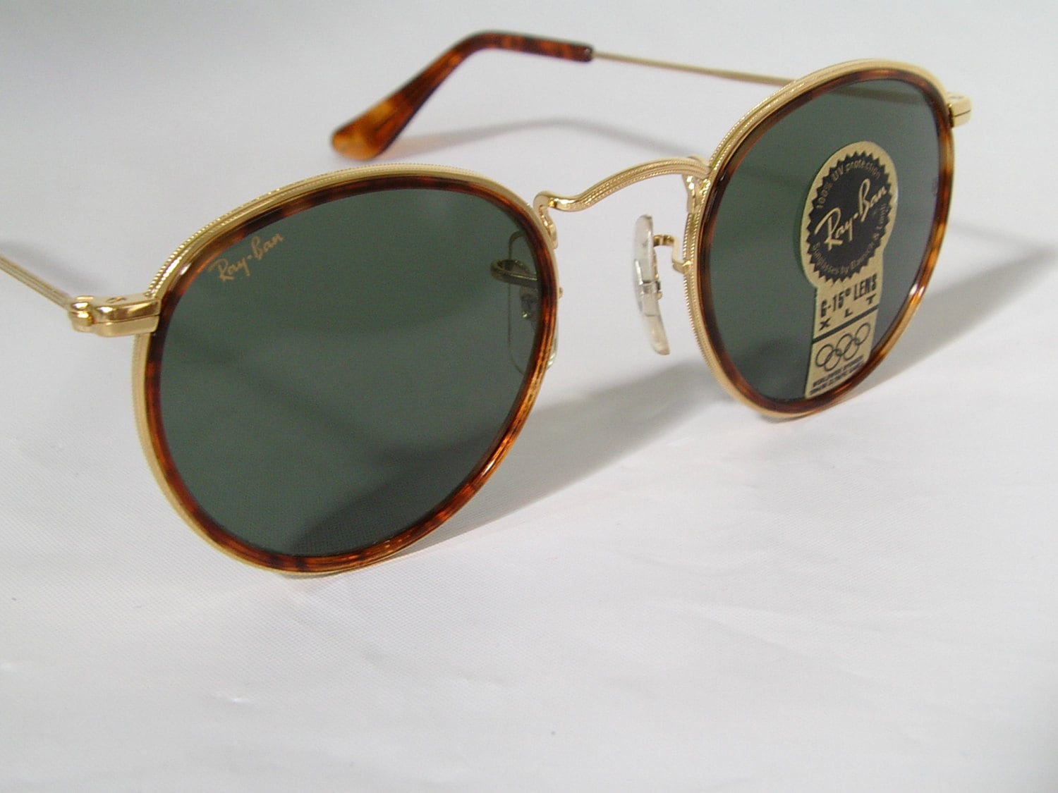 New Vintage B&L Ray Ban Small Round Metal with Tortoise W1675 47mm Tortuga  Sunglasses USA – Haute Juice