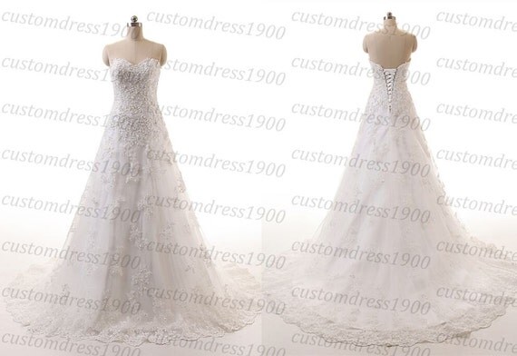 appliquéd embroidered tulle gown in white