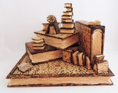 Handcarved Pinus Cembra wood sculpture â€“ Miniatured books with a snail