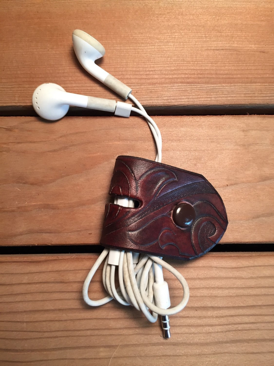 Handmade leather earphone/ earbud holder by JLeatherLotus on Etsy