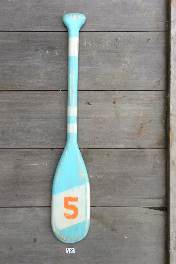 Miniature canoe paddles hand crafted out of pine. Great