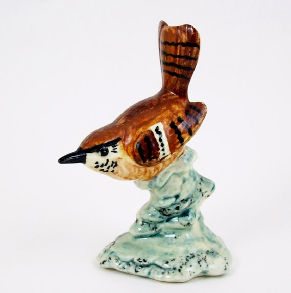 brown bird figurine