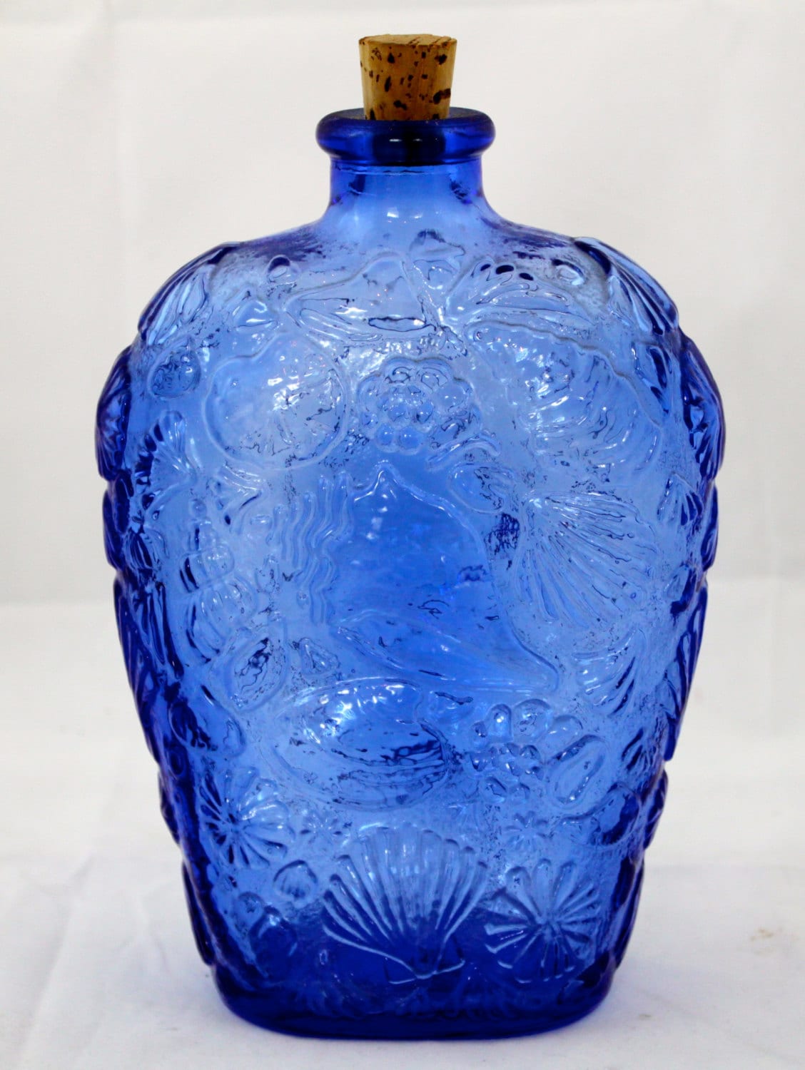 Vintage Cobalt Blue Glass Bottle with Seashell Design from