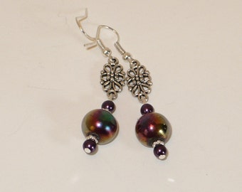 silver filigree and purple firepolished bead dangle earrings.