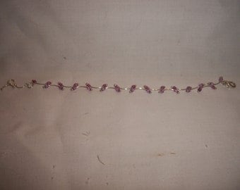 Pink and purple beaded wire bracelet
