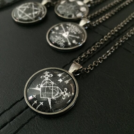 Heart & Swords Necklace by EnchantedRumors on Etsy