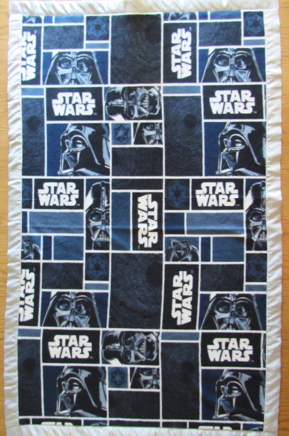 Star Wars fleece blanket with gray satin edge in sizes babby, toddler, oversize toddler, adult throw, and twin